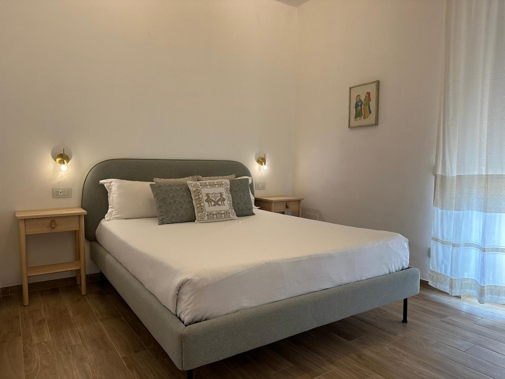 Ng Guest House L'Acquedotto 奧爾比亞 外观 照片