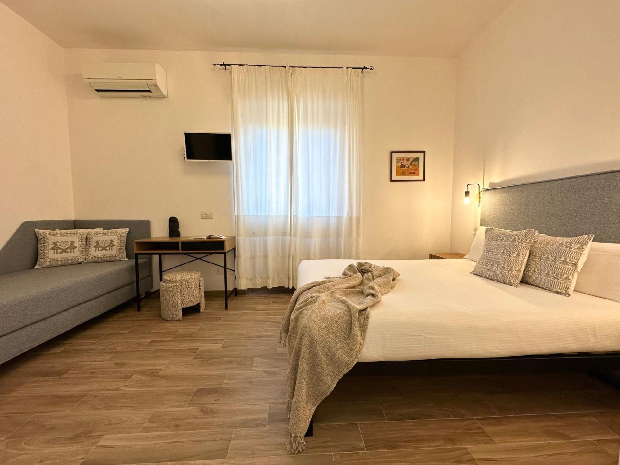 Ng Guest House L'Acquedotto 奧爾比亞 外观 照片