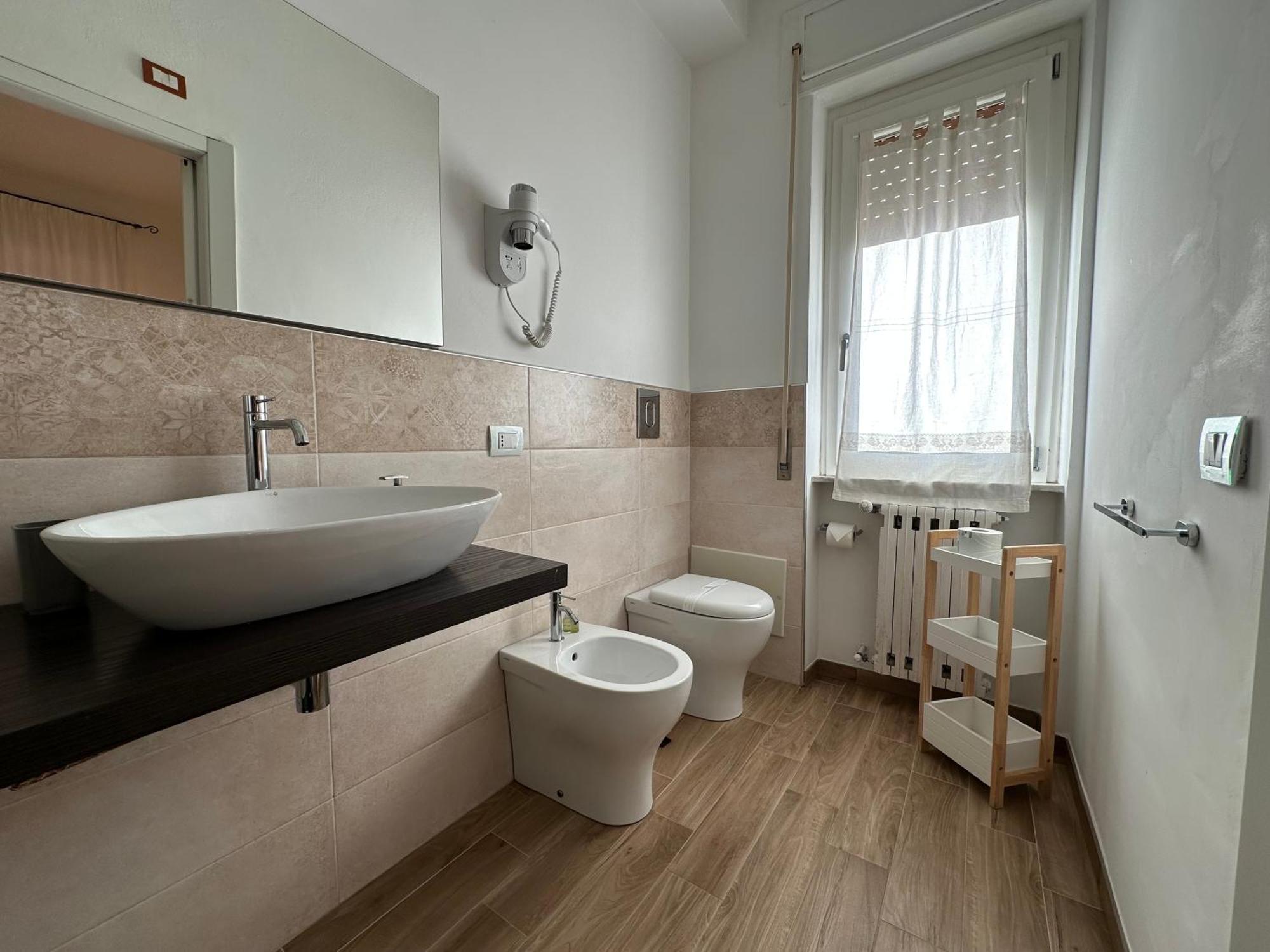 Ng Guest House L'Acquedotto 奧爾比亞 外观 照片