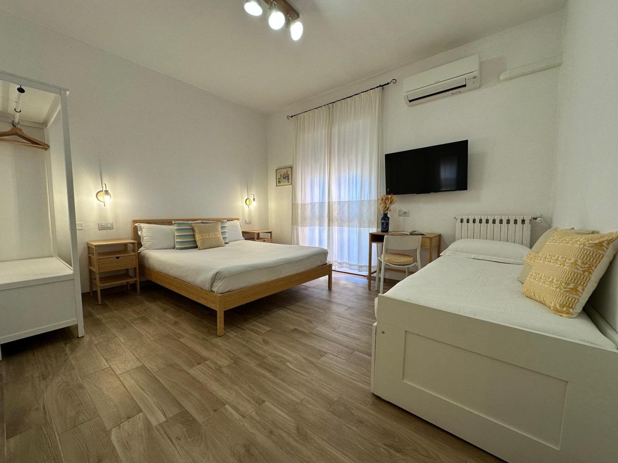 Ng Guest House L'Acquedotto 奧爾比亞 外观 照片