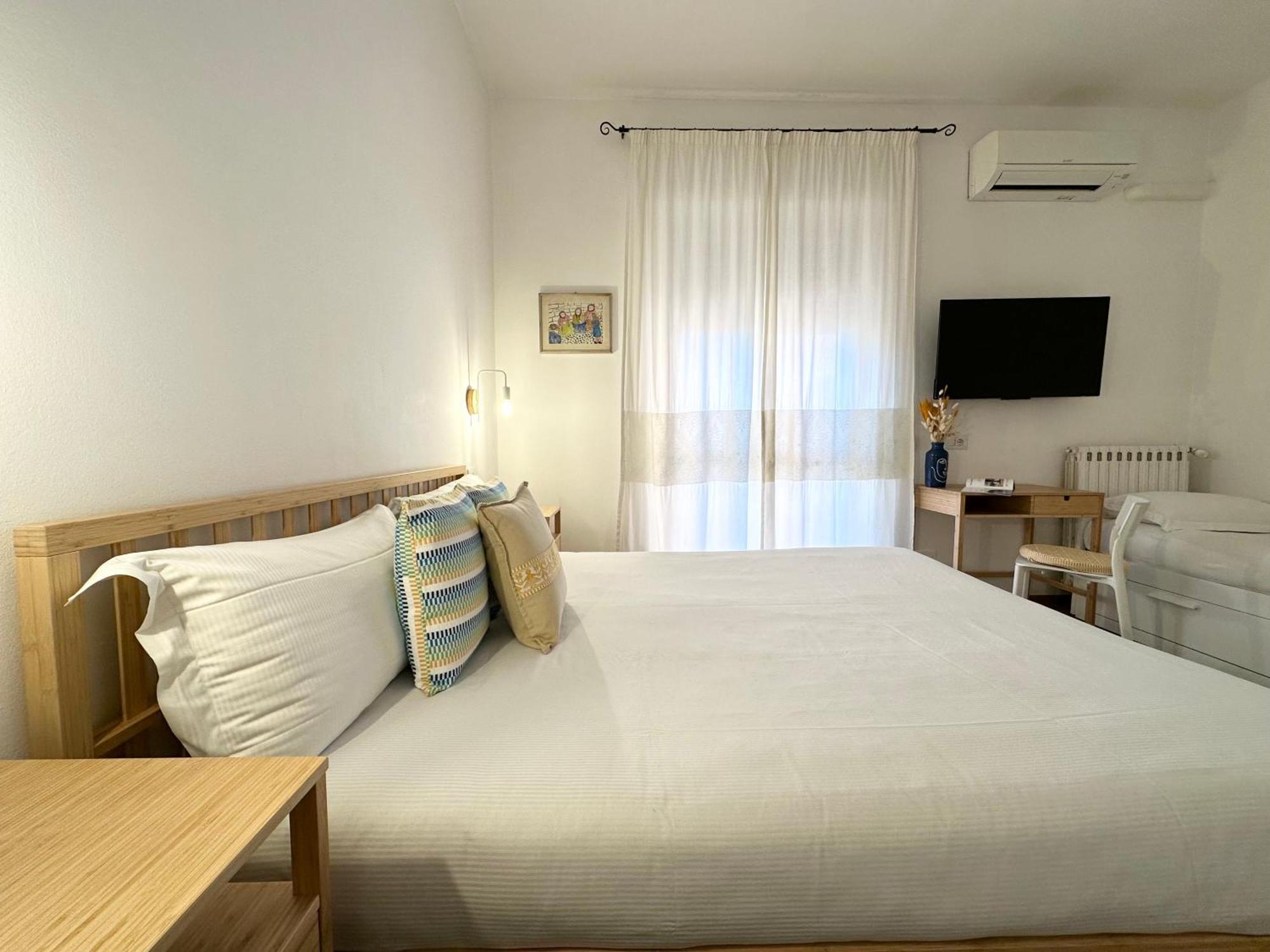 Ng Guest House L'Acquedotto 奧爾比亞 外观 照片